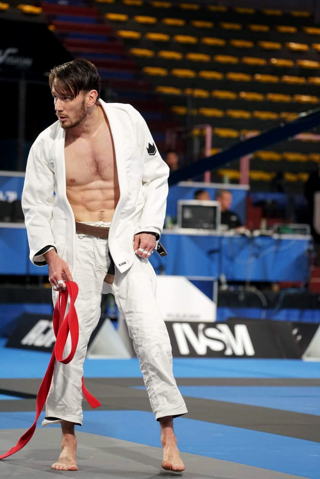 Prise debout pendant une compétition de jiu-jitsu